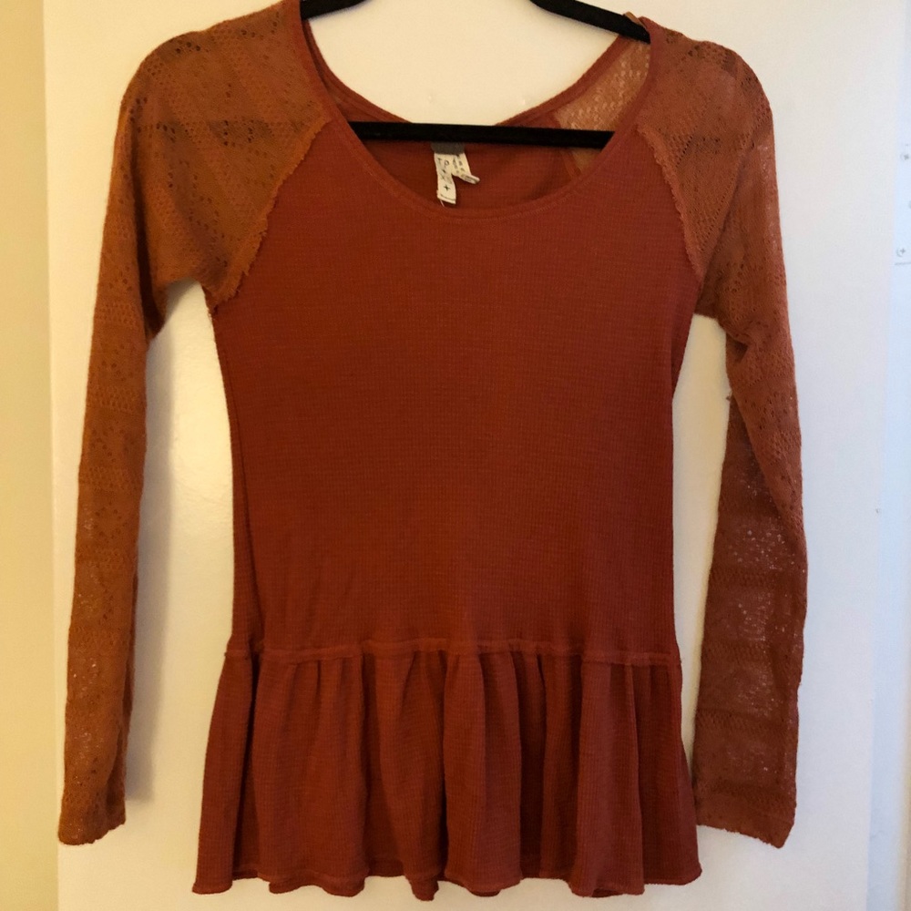 Burnt orange peplum top by free people
